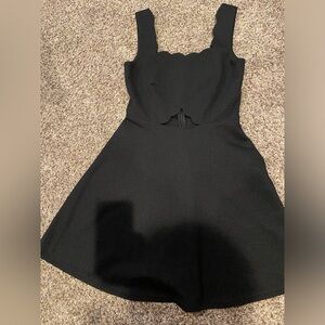 Black dress with front cut out. Back zipper. Size xsmall.